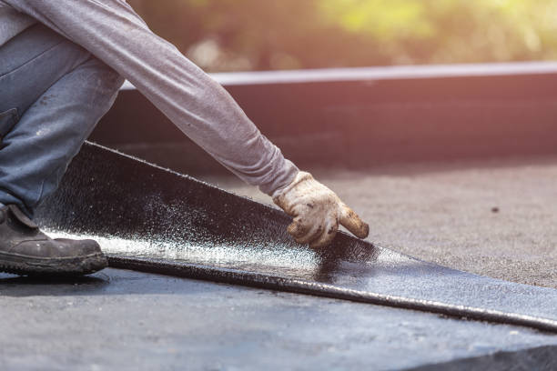 Professional Emergency Waterproofing technician working in Russellville, TN